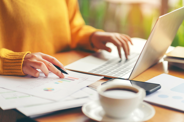 Photo of a woman using a laptop